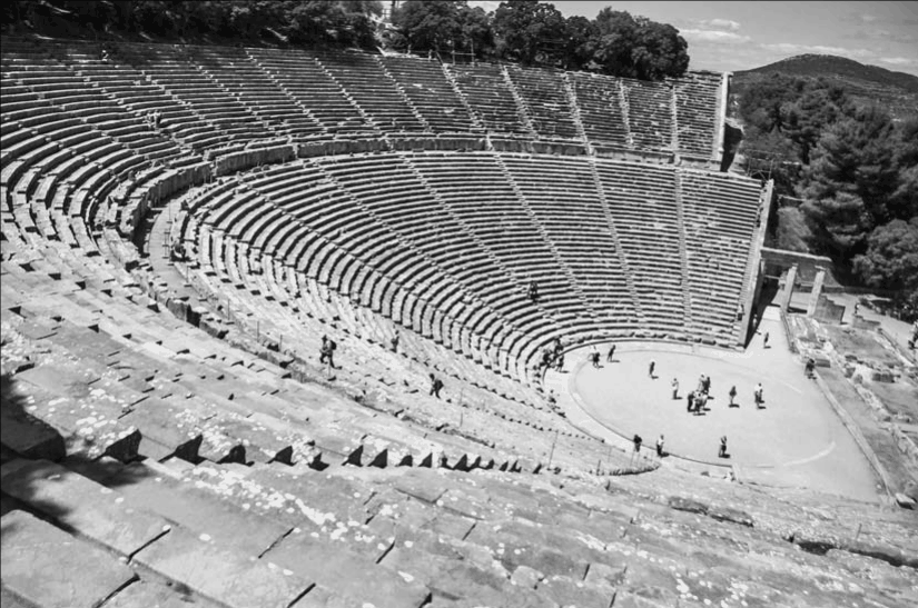 The stone steps of an ancient theater in Greece